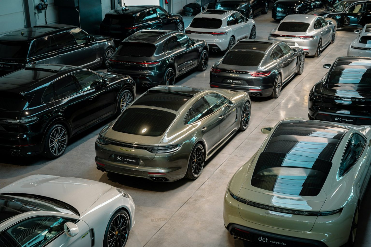 Brits Still in Love with Their Cars Despite Rising Costs a bunch of cars are parked in a garage