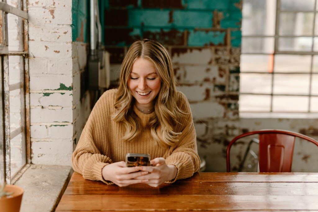 Borrower checking a loan account on a smartphone: Post-Approval Customer Care: A Core Duty of Responsible Credit Providers